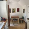 Photo 5: The kitchen with door onto patio