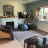 Photo 6: The sitting room with open fire. 
