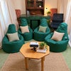 Photo 8: Attic storage space mainly behind Curtains and a make shift  Cinema  with projector and screen palus