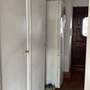 Photo 9: Front entry. Two hall closets and the refrigerator.