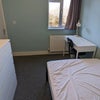 Photo 3: Bedroom 1: Lots of natural light.