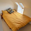 Photo 2: Sleeping area in part of the L shaped room