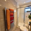 Photo 5: This is one of the two bathrooms and it is located next to your bedroom.  I'm happy to discuss makin