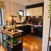 Photo 3: This is the kitchen area in the open plan living area