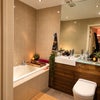 Photo 6: This is the second bathroom, located within the master bedroom