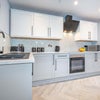 Photo 12: Communal Kitchen