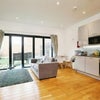 Photo 5: Loung/Kitchen Area