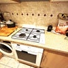 Photo 6: Washing machine & cooker