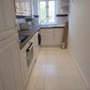 Photo 5: Long, bright kitchen