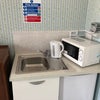 Photo 2: Bedroom with private kitchenette