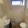 Photo 7: Downstairs Toiler