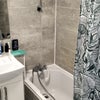 Photo 4: shared upstairs bathroom