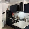 Photo 3: Open plan kitchen