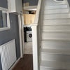 Photo 5: Main floor hallway, kitchen to the rear, stairs to bathroom.