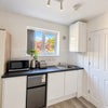 Photo 6: Fridge freezer, toaster, kettle, microwave