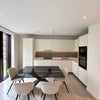 Photo 6: Other side of the living room - fully furnished kitchen with microwave, oven, toaster, kettle, etc