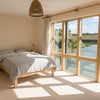 Photo 7: Top floor master double with pond views