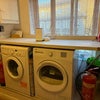 Photo 9: Communal washing machine and tumble dryer