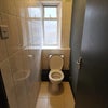 Photo 9: Shared Toilet