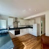 Photo 3: Large kitchen.....