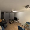 Photo 1: Shared living room (AI used to remove personal belongings and identifiable views)