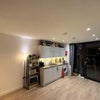 Photo 2: Shared kitchen (AI used to remove personal belongings and identifiable views)