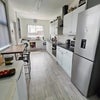 Photo 2: Shared Kitchen