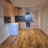 Photo 2: Living / Kitchen Space
