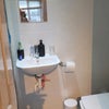 Photo 2: En suit shower and toilet