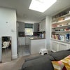 Photo 5: Kitchen and living area