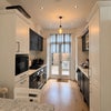Photo 2: Kitchen into Garden