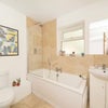 Photo 6: Bathroom with bath 