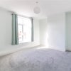 Photo 2: Bright & Airy Reception Room