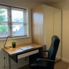 Photo 8: Desk and desk chair provided 