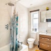 Photo 7: Downstairs bath and shower