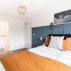 Photo 2: Feature wall with panelling