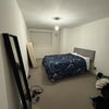 Photo 6: Bedroom with bed (excuse my things!)