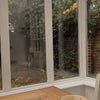 Photo 4: Conservatory and back garden