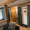 Photo 9: Living Area facing the Bathroom