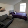 Photo 1: Spacious double room with sofa and Smart TV