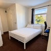 Photo 2: Bedroom with study space