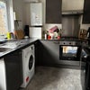 Photo 5: The Kitchen! Washing machine, dryer and Gas cooker