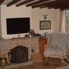 Photo 6: Lounge fireplace from hall doorway