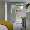 Photo 2: Opening onto courtyard garden