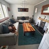 Photo 3: Lounge with woodburner