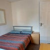 Photo 8: Comfy bed with new mattress room  located upstairs next to main bathroom 