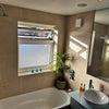 Photo 5: Private bathroom/shower  