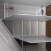 Photo 8: Lots of Storage space in hidden Wardrobes