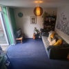 Photo 2: Living room, side view. Furniture included, inc sofa bed (on the right)