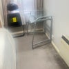 Photo 4: Single rm, desk, chair folded, wide window , vynl wardrobe 